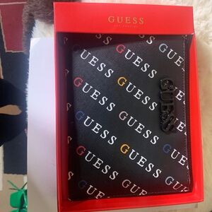 Guess wallet with wrist strap